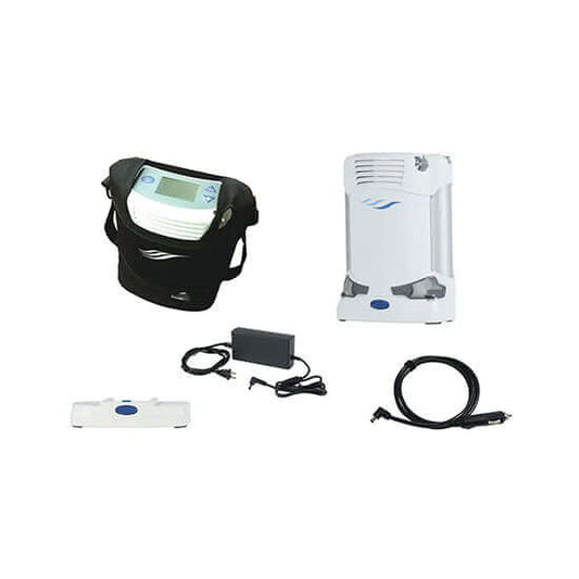 Oxygen concentrator for travel with carrying case, batteries, and cables for portable use.