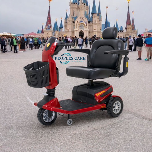 Heavy Duty 3 Wheel Scooter Rental - Golden Companion at theme park with stylish design and spacious seat.