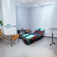Advanced Homecare Hospital Bed Rental Bundle featuring a fully electric hospital bed and adjustable bedside table.