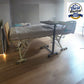 Medical Bed Rental - Hi-low profile electric hospital bed with adjustable height and side table.