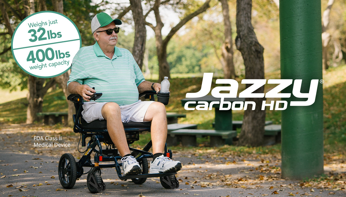 Jazzy Carbon Heavy Duty Travel Power Wheelchair Rental in use, highlighting its 32 lbs weight and 400 lbs weight capacity.
